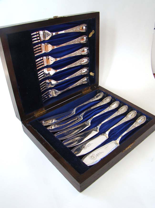 A wonderful cased set of English silver plated fish knives and forks circa 1910